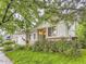 Beautiful home with a well-maintained lawn and inviting curb appeal, enhanced by lush greenery at 19346 E Clear Creek Way, Parker, CO 80134