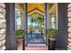 Inviting entryway with high ceilings and a view of the backyard at 290 Skyhill Dr, Evergreen, CO 80439