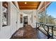 Inviting foyer with tile flooring, wood trim, and scenic mountain views at 290 Skyhill Dr, Evergreen, CO 80439