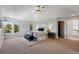 Bright main bedroom with vaulted ceiling, sitting area, and an ensuite bathroom at 290 Skyhill Dr, Evergreen, CO 80439