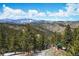 Beautiful view of the mountains and forest at 290 Skyhill Dr, Evergreen, CO 80439