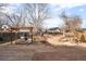 Backyard featuring a patio, outdoor seating, and a pergola, perfect for outdoor relaxation and entertainment at 7551 S Garland St, Littleton, CO 80128