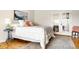 Comfortable bedroom with a bed, soft lighting, and elegant decor, perfect for relaxation at 7551 S Garland St, Littleton, CO 80128