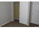 Closet features a neutral color scheme with sliding doors and a clothing rod at 18784 E Linvale Pl, Aurora, CO 80013
