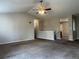 Cozy living room with neutral walls and plush carpeting at 18784 E Linvale Pl, Aurora, CO 80013