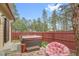 Backyard hot tub area, perfect for relaxation and entertaining at 30400 Hilltop Dr, Evergreen, CO 80439