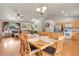 Spacious living area with dining table, living room, and an open kitchen design at 30400 Hilltop Dr, Evergreen, CO 80439