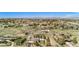Expansive aerial view of a property with a house, pool, and detached garage at 6871 S Himalaya Way, Centennial, CO 80016