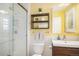 Bright and updated bathroom with a glass-enclosed shower, a sleek vanity, and modern fixtures at 6871 S Himalaya Way, Centennial, CO 80016