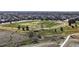 This is an aerial view showing the expansive neighborhood green space and walking trails at 13485 Niagara St, Thornton, CO 80602