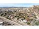 Community aerial shot of a neighborhood with mountain views, showcasing the beautiful scenery at 717 Anderson St, Castle Rock, CO 80104