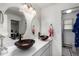 Bathroom boasts dual vessel sinks, stylish fixtures, and a separate toilet area at 717 Anderson St, Castle Rock, CO 80104