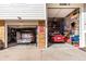 Exterior view of garage with lifts for cars at 717 Anderson St, Castle Rock, CO 80104