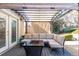 Covered patio with outdoor seating and fire pit at 717 Anderson St, Castle Rock, CO 80104