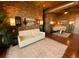 Comfortable living room with a white sofa and unique decor elements at 10111 Inverness Main St # 223, Englewood, CO 80112