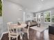 Cozy dining area adjacent to the living room, featuring a table with seating for four at 14565 Vancouver Pl, Parker, CO 80134