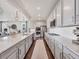 Modern kitchen with stainless appliances, granite countertops, and spacious cabinetry at 14565 Vancouver Pl, Parker, CO 80134
