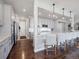 Bright kitchen featuring stainless steel appliances and sleek cabinetry with pendant lights at 14565 Vancouver Pl, Parker, CO 80134