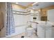 Clean bathroom with a bathtub, shower, and vanity at 1499 Blake St # 4O, Denver, CO 80202