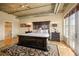 Spacious main bedroom with large windows and ensuite bathroom at 1499 Blake St # 4O, Denver, CO 80202