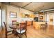 Kitchen dining area with dark wood table and chairs at 1499 Blake St # 4O, Denver, CO 80202