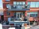 Building exterior showcasing two private balconies at 1499 Blake St # 4O, Denver, CO 80202