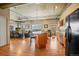 Open kitchen features island, wood cabinets, and stainless steel appliances at 1499 Blake St # 4O, Denver, CO 80202