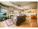 Spacious living room with leather sofas, hardwood floors, and fireplace at 1499 Blake St # 4O, Denver, CO 80202