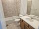 Cozy bathroom with tub and shower combo, and single sink vanity at 17156 W 92Nd Loop, Arvada, CO 80007