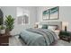 Well-staged bedroom showcasing ample natural light and a serene color palette at 17156 W 92Nd Loop, Arvada, CO 80007