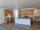 Bright kitchen features stainless appliances, stylish cabinetry, and a center island for food preparation at 17156 W 92Nd Loop, Arvada, CO 80007