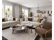 Elegant living room featuring neutral sofas, marble-topped coffee table, and stylish decor at 17156 W 92Nd Loop, Arvada, CO 80007
