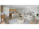 Inviting open-concept living space with a view of the kitchen and dining area at 17156 W 92Nd Loop, Arvada, CO 80007
