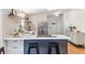 Bright kitchen with a modern island, stainless steel appliances, and stylish decor at 5523 Tejon St, Denver, CO 80221