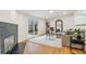Comfortable living room with a fireplace, sliding glass doors, and hardwood floors at 5523 Tejon St, Denver, CO 80221