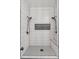 Updated shower featuring eye-catching black fixtures, a convenient bench, and a built-in shower product nook at 5523 Tejon St, Denver, CO 80221