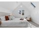 Bedroom featuring neutral decor, a skylight, and bright natural light at 1529 E 22Nd Ave, Denver, CO 80205