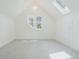 Empty bedroom featuring neutral décor, bright natural light, and built in cabinets at 1529 E 22Nd Ave, Denver, CO 80205