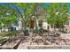 Inviting home front with well-tended landscaping and a quaint, welcoming facade at 1529 E 22Nd Ave, Denver, CO 80205