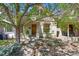 Charming home featuring a manicured front yard and a welcoming entryway at 1529 E 22Nd Ave, Denver, CO 80205