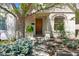 Close-up of a front exterior showcasing a well-kept yard and inviting entrance at 1529 E 22Nd Ave, Denver, CO 80205