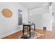 Bright office features a modern chair and desk upon hardwood floors and a neutral rug at 1529 E 22Nd Ave, Denver, CO 80205