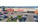 Aerial view of a Super Target and parking area with well-maintained landscaping and ample parking spaces at 7932 E 49Th Pl, Denver, CO 80238