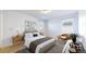 Inviting main bedroom with stylish decor and plenty of natural light at 7932 E 49Th Pl, Denver, CO 80238