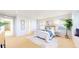 Spacious bedroom with attached bathroom and a comfortable, relaxing setting at 7932 E 49Th Pl, Denver, CO 80238