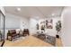 Finished basement featuring an office area with a desk and decor, wood floor at 7932 E 49Th Pl, Denver, CO 80238
