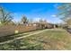 Spacious backyard with privacy fence and lush greenery, perfect for outdoor enjoyment at 3251 N Adams St, Denver, CO 80205