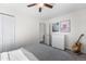 Bedroom features a guitar, closet and stylish artwork at 3251 N Adams St, Denver, CO 80205