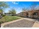 Cozy home featuring stone accents, a well-kept lawn, and inviting walkway at 3251 N Adams St, Denver, CO 80205