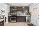 Well-equipped kitchen features stainless steel appliances and granite countertops at 3251 N Adams St, Denver, CO 80205